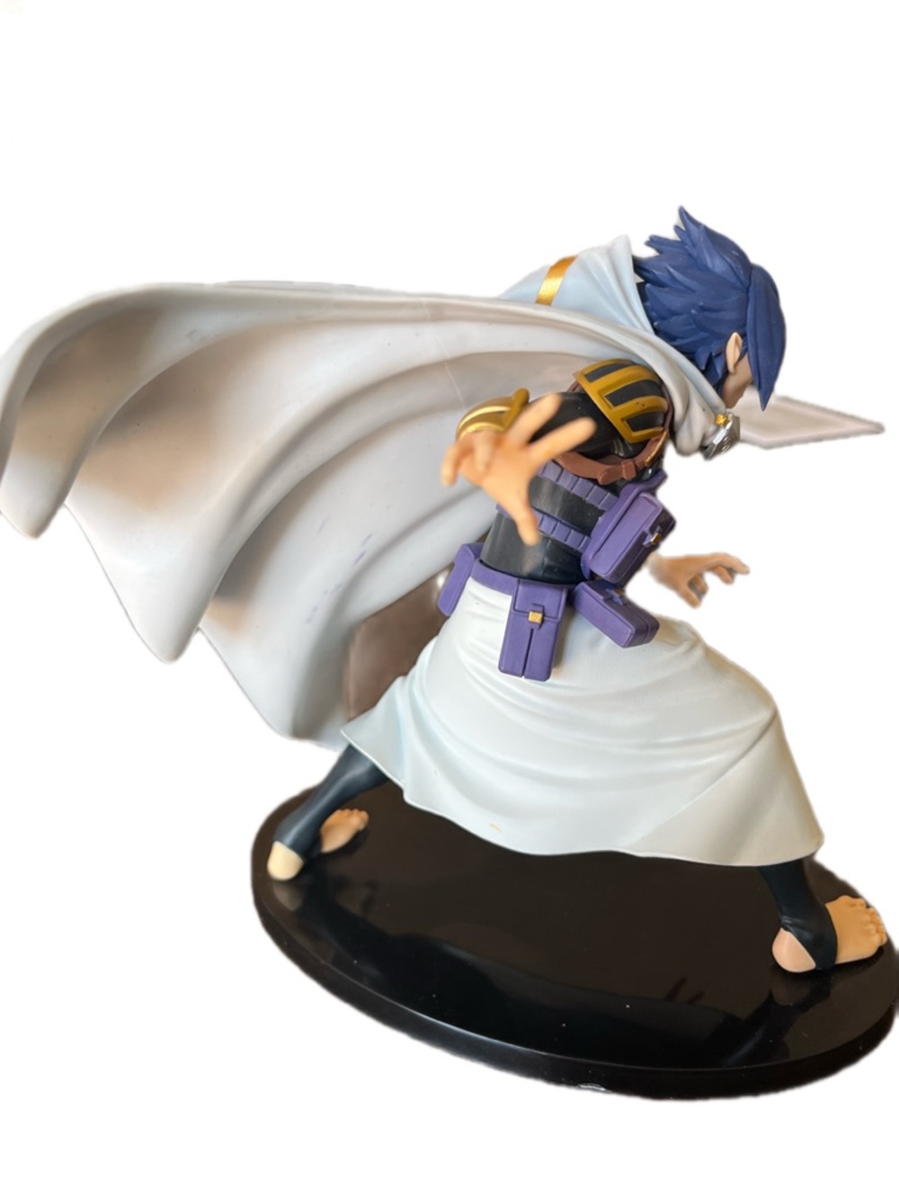 Anime Figure with White Cape & Purple Accents